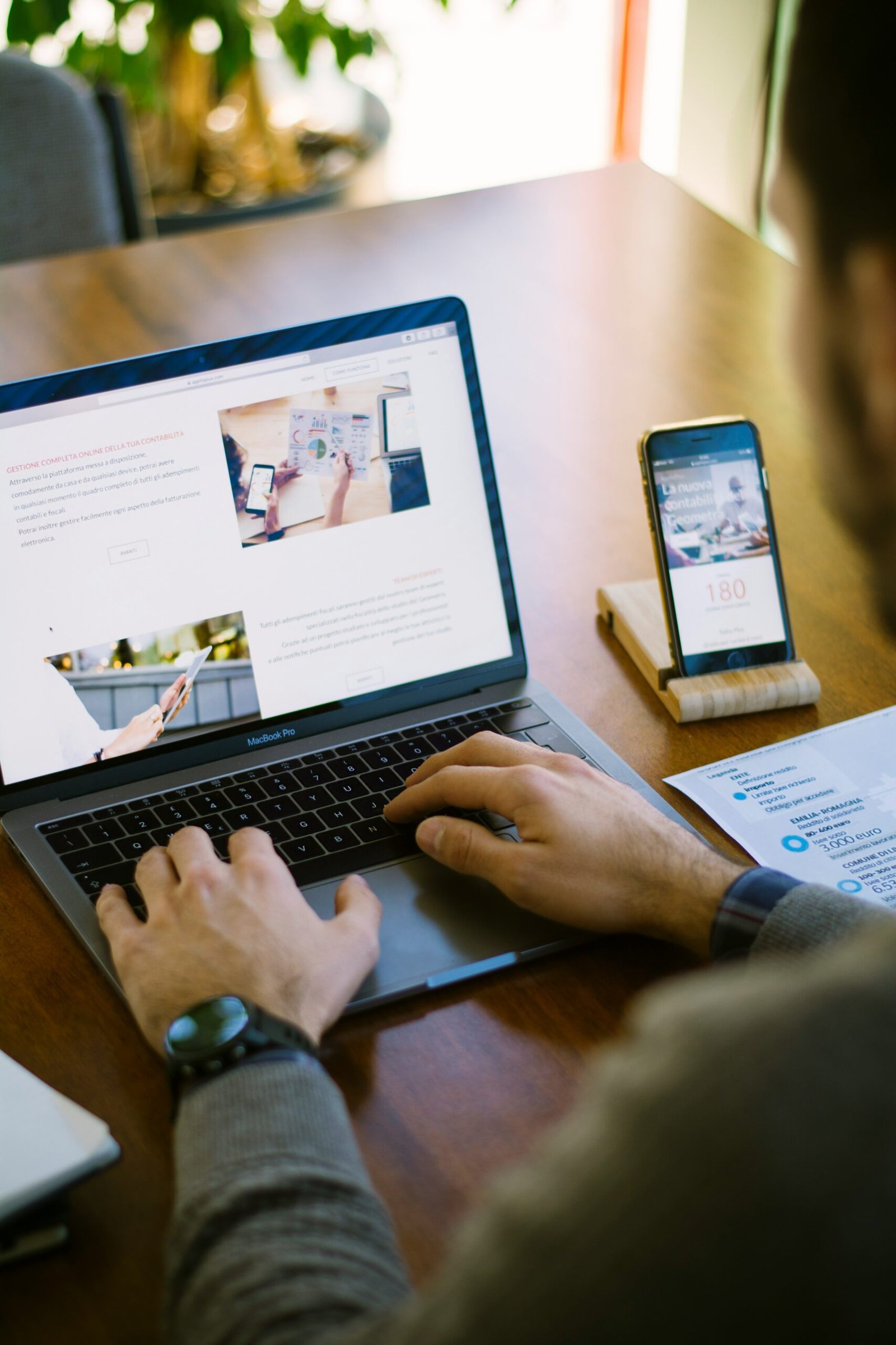 selective focus photography of person using black laptop computer